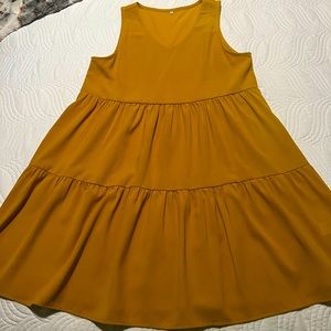 Yellow casual flowy dress. Sleeveless. Size medium. No flaws.